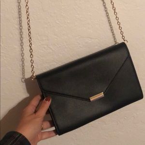 Aldo black and gold clutch purse